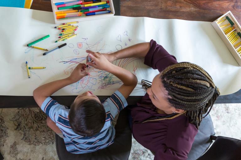 Mum and son drawing